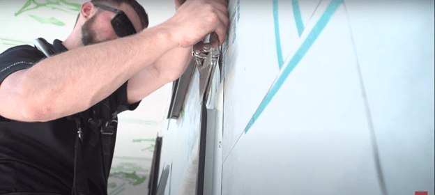 hand-seam-trim-corrugated-doorway
