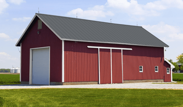 Gray metal roof on a red barn