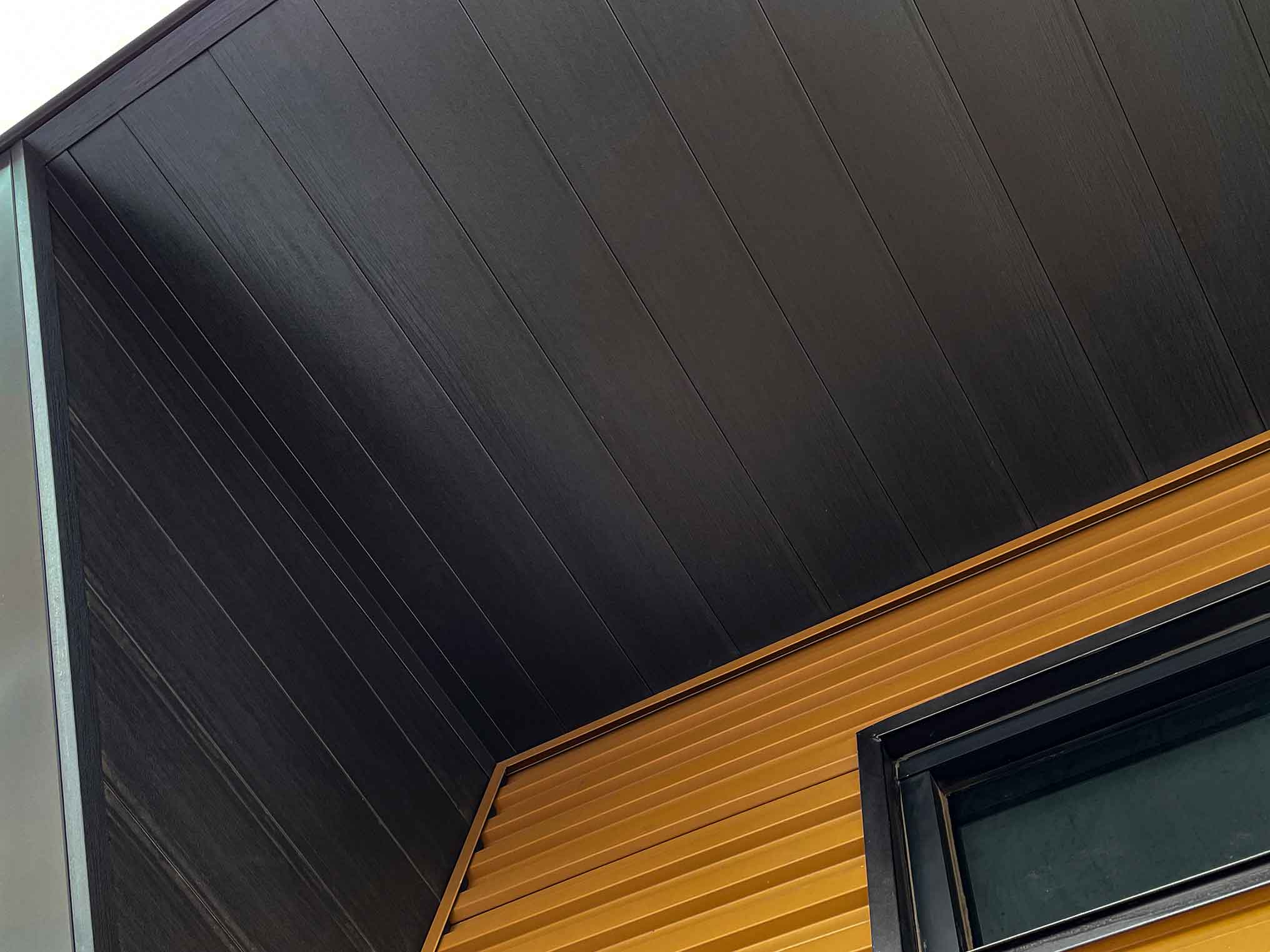Burnt Wood T8 Plankwall® Metal Siding That Looks Like Wood